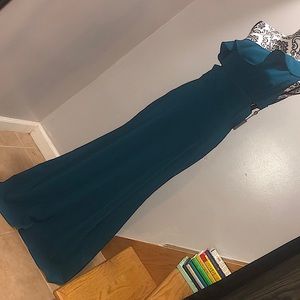 One shoulder floor length teal gown